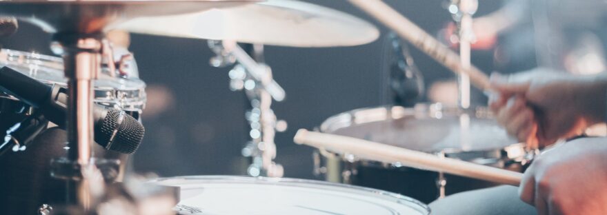 tilt shift photo of acoustic drum set