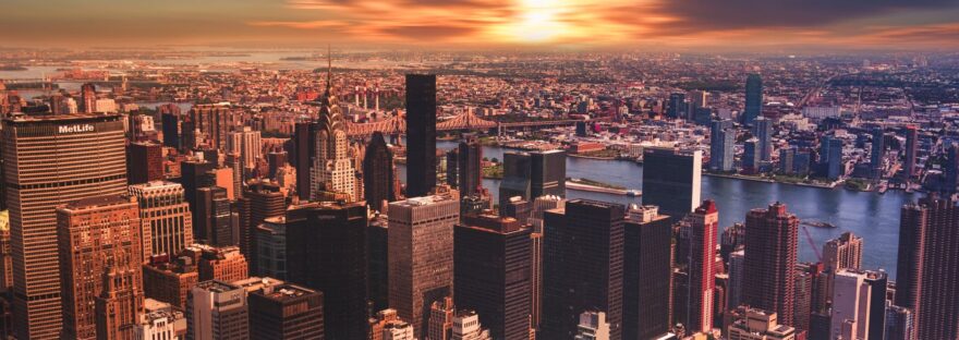 high angle view of cityscape against cloudy sky