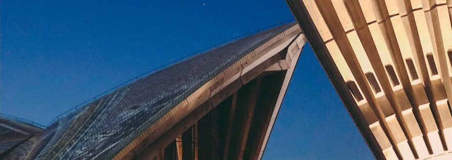 an architectural building under the blue sky