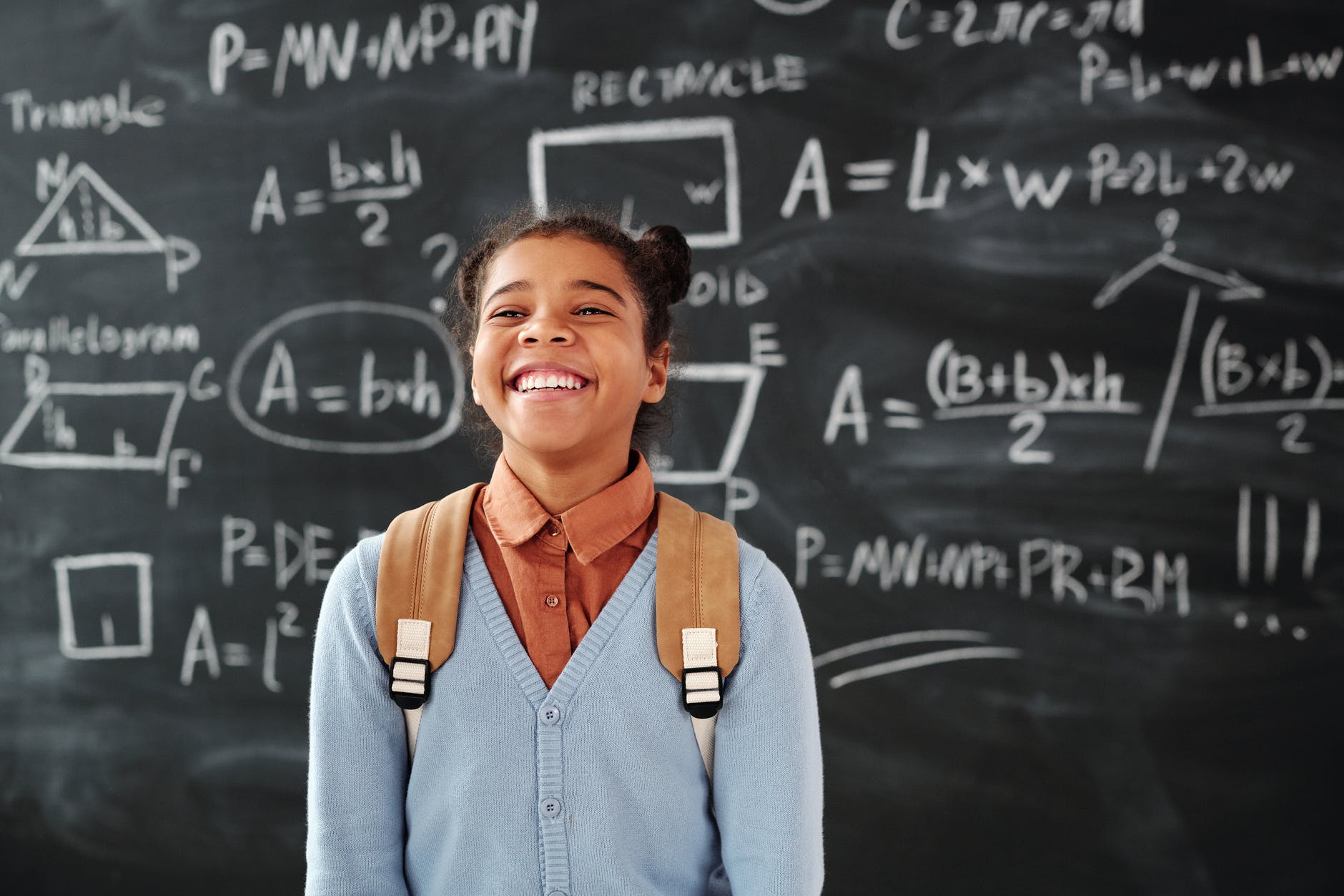 girl writing mathematics school