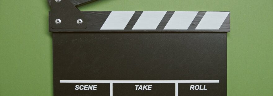 clapper board in green surface